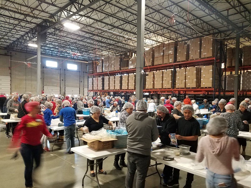 The 2-day pack event took place in the Pet Factory facility and over 2,200 community volunteers packed 544,320 meals.